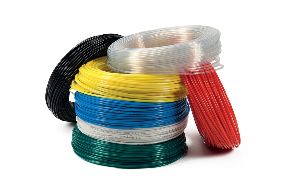 Spiral coiled polyurethane 98 MB-LONGLIFE tubes red, yellow, green and light blue by Mebra Plastik