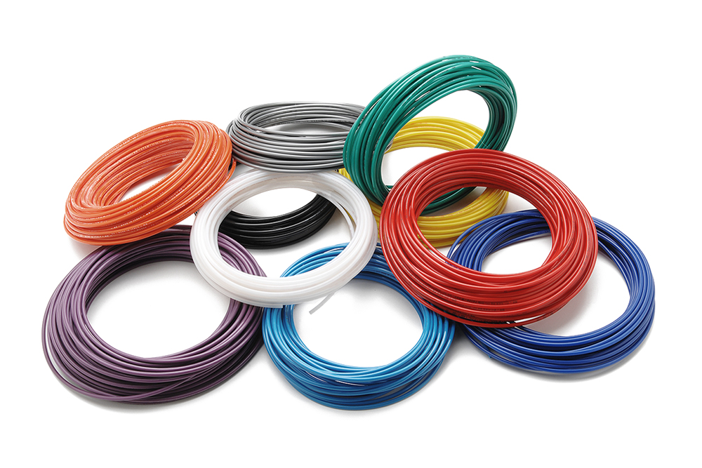 Linear coiled polyammide tubes RILSAN® PA 11 PHL orange, green, grey, neutral, blue, light blue, yellow, purple by Mebra Plastik