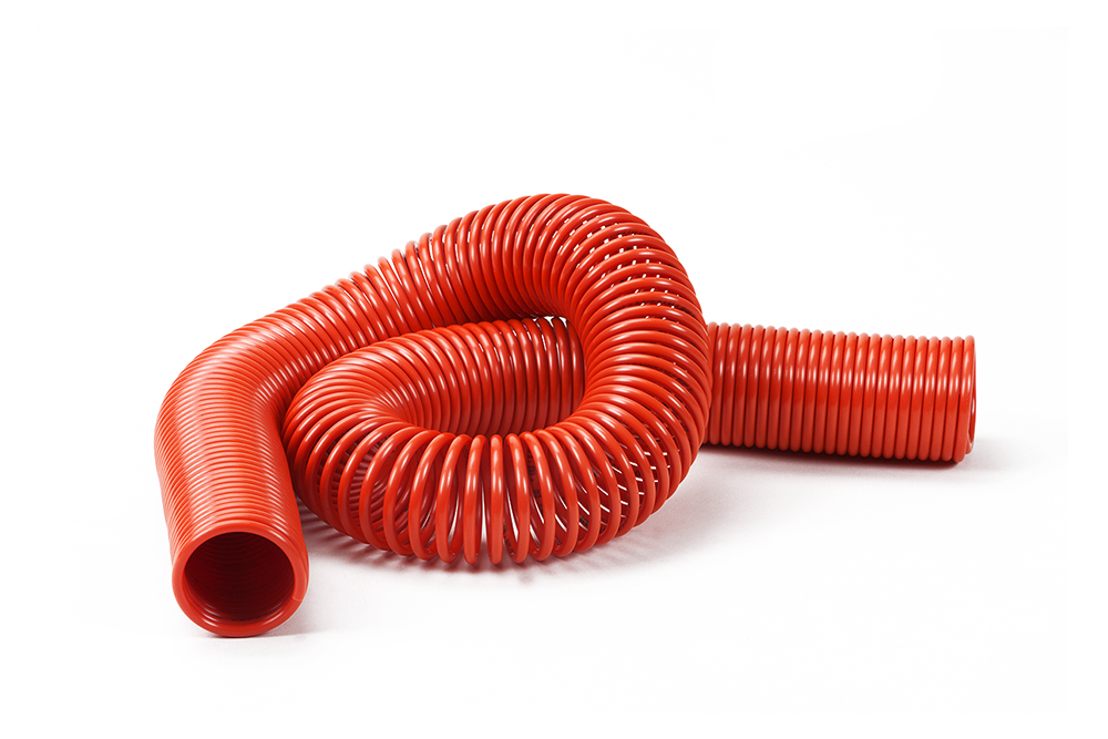 Spiral coiled polyamide NYLON P10 tube orange by Mebra Plastik